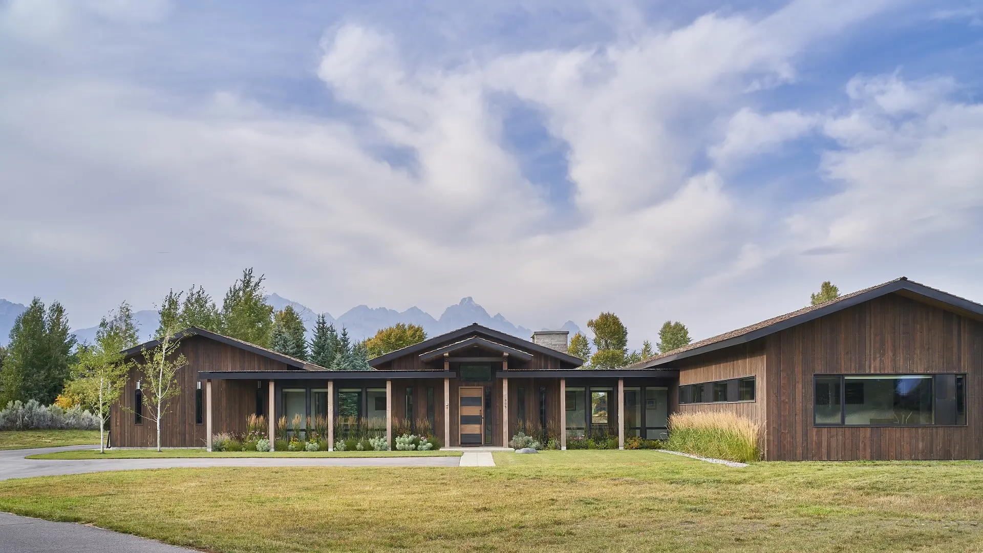 Full exterior view of the front of G&T House, a custom home designed and built by Farmer Payne Architects.