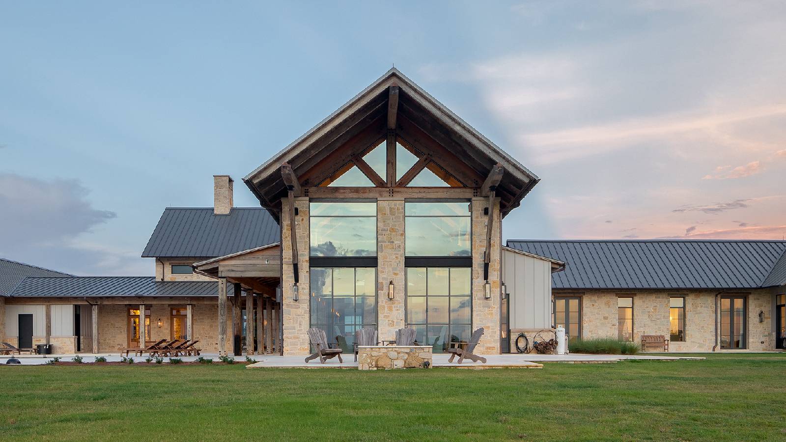 Exterior view of the back of Texas Ranch, a custom home designed and built by Farmer Payne Architects.