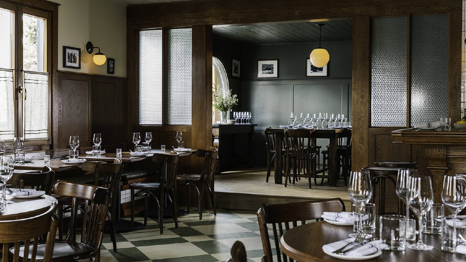 Interior view of the dining area at Glorietta Trattoria restaurant, a custom renovation project designed by Farmer Payne Architects.