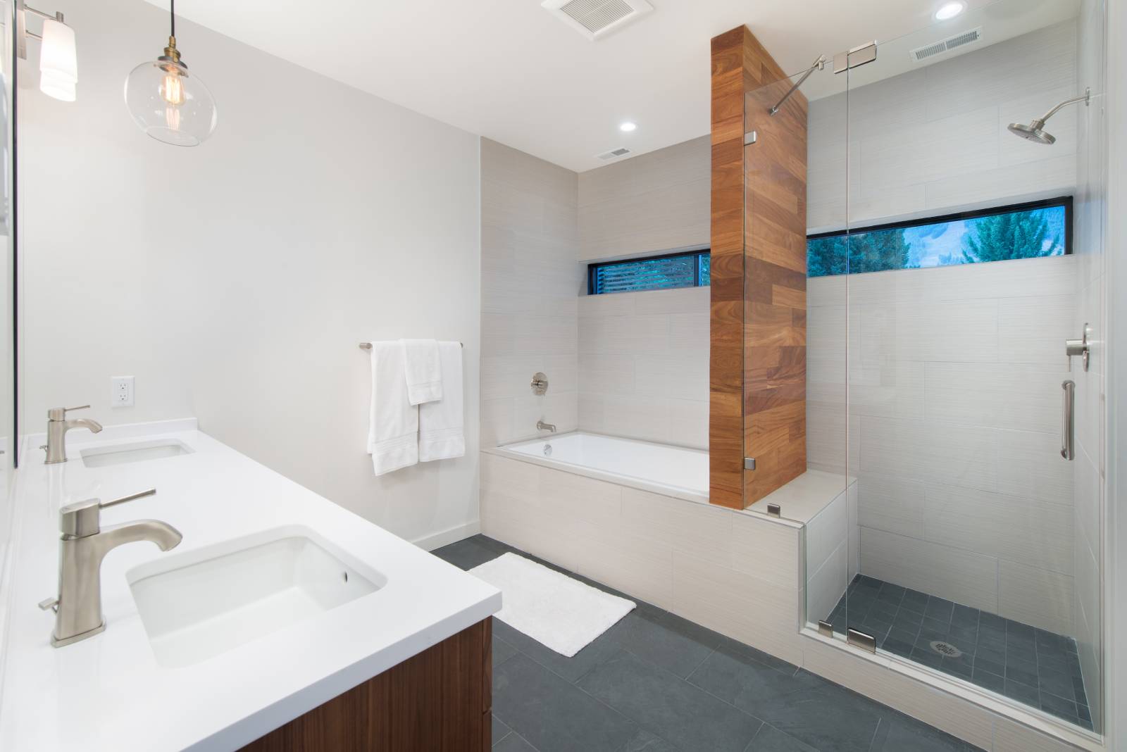 Interior view of the main bathroom at Gill 3+4, a custom home designed and built by Farmer Payne Architects.