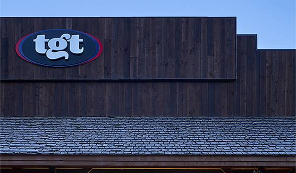 Exterior detailed view of the facade at TGT Stickets, a custom retail space designed by Farmer Payne Architects.
