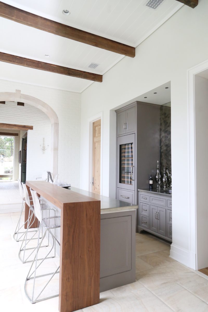 Interior view of the kitchen at French Influential, a custom home designed and built by Farmer Payne Architects.
