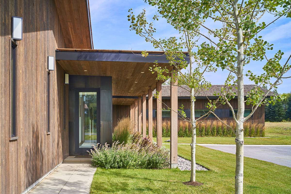 Exterior view of the front garden at G&T House, a custom home designed and built by Farmer Payne Architects.