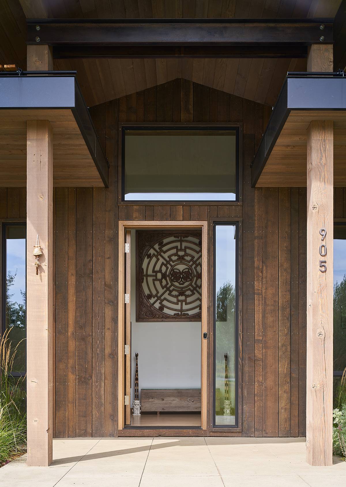 Exterior view of the front entryway at G&T House, a custom home designed and built by Farmer Payne Architects.