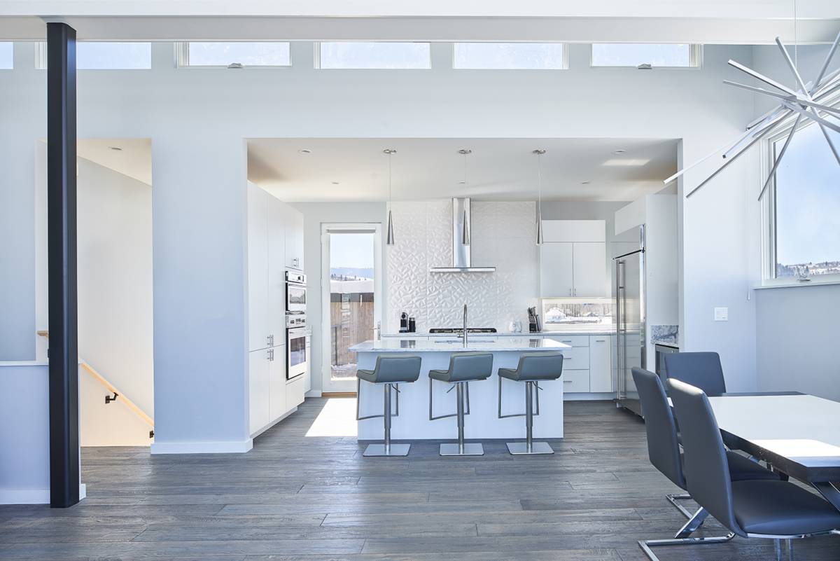 Interior view of the kitchen at Antelope Flats, a custom home designed and built by Farmer Payne Architects.