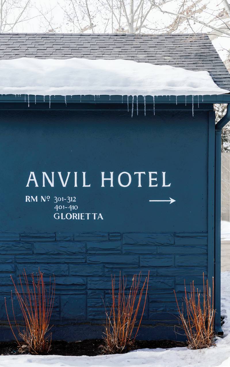 Exterior view of the facade at the Anvil Hotel, a custom renovation project designed by Farmer Payne Architects.