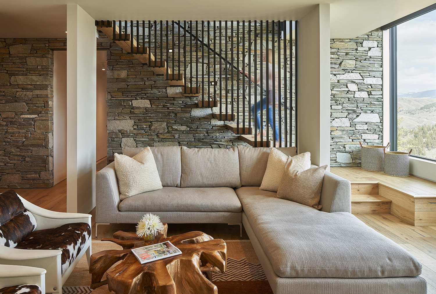 Interior view of the family room and stairwell at Gros Ventre West, a custom home designed and built by Farmer Payne Architects.