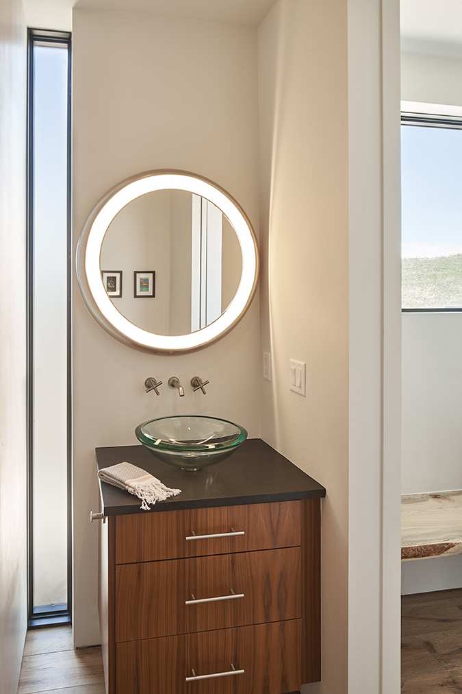 Interior view of the guest bathroom at Gros Ventre West, a custom home designed and built by Farmer Payne Architects.