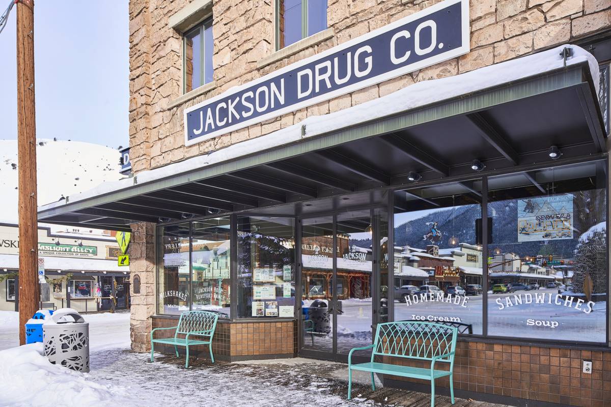 Exterior view of the front entry at Jackson Drug, a custom renovation project designed by Farmer Payne Architects.