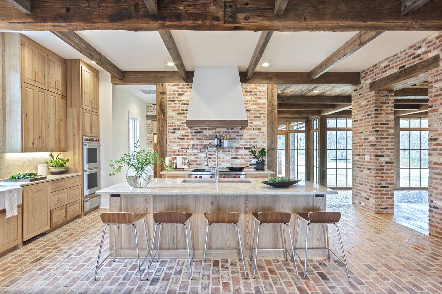 Interior view of the kitchen at Louisiana Rustic, a custom home designed and built by Farmer Payne Architects.