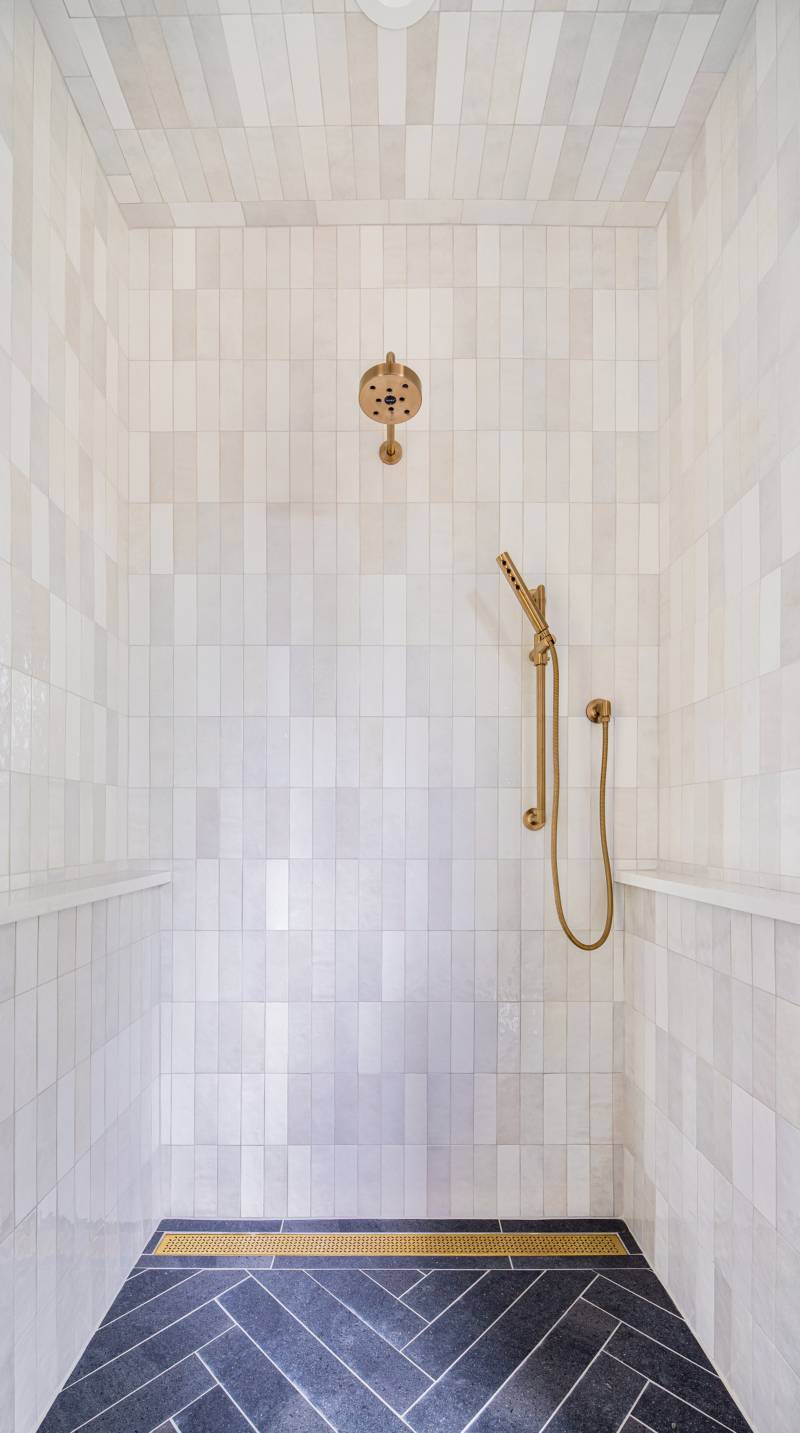 Interior view of the main bathroom shower at Oak Alley, a custom home designed and built by Farmer Payne Architects.