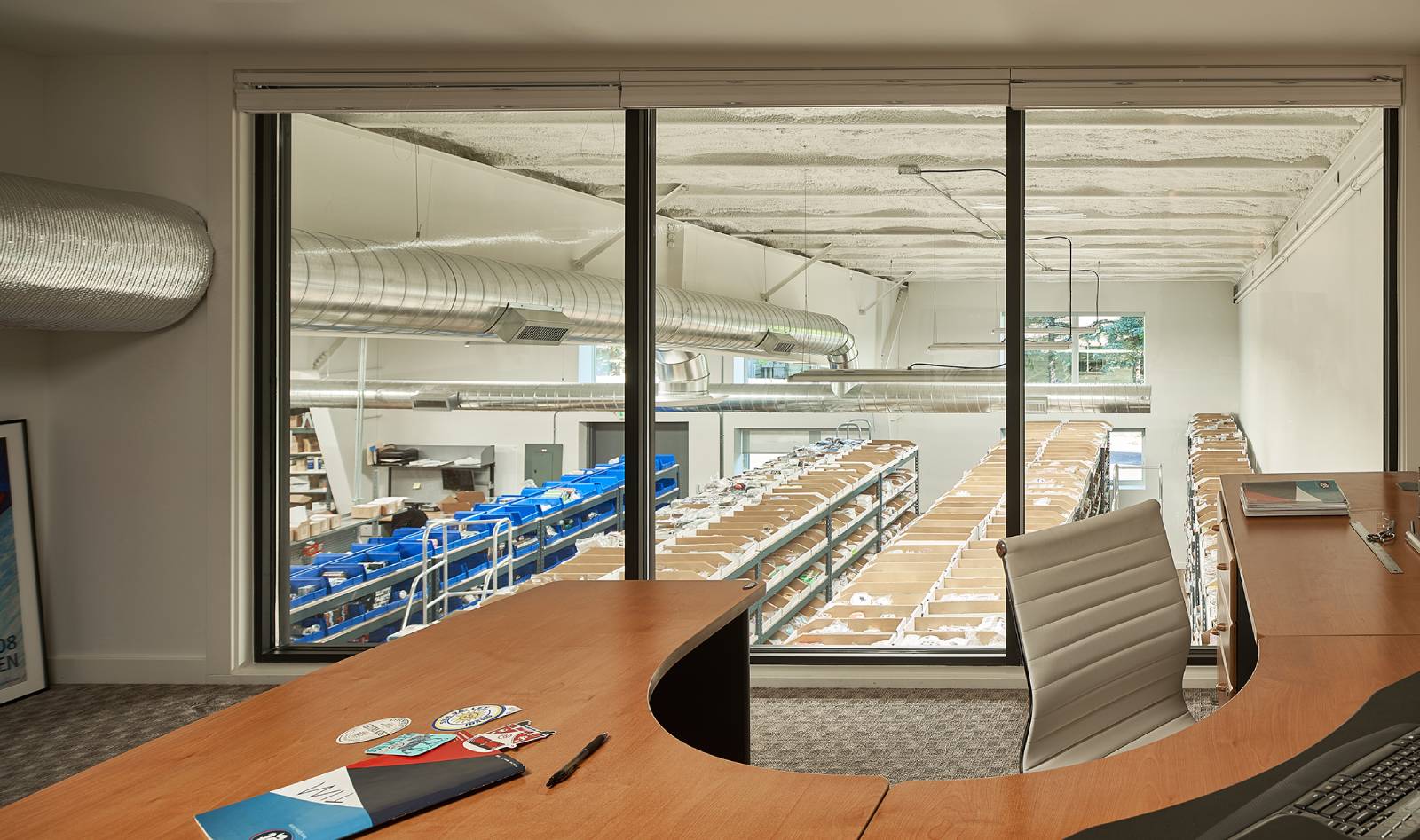 Interior view of upper level office space at TGT Stickets, a custom retail space designed by Farmer Payne Architects.