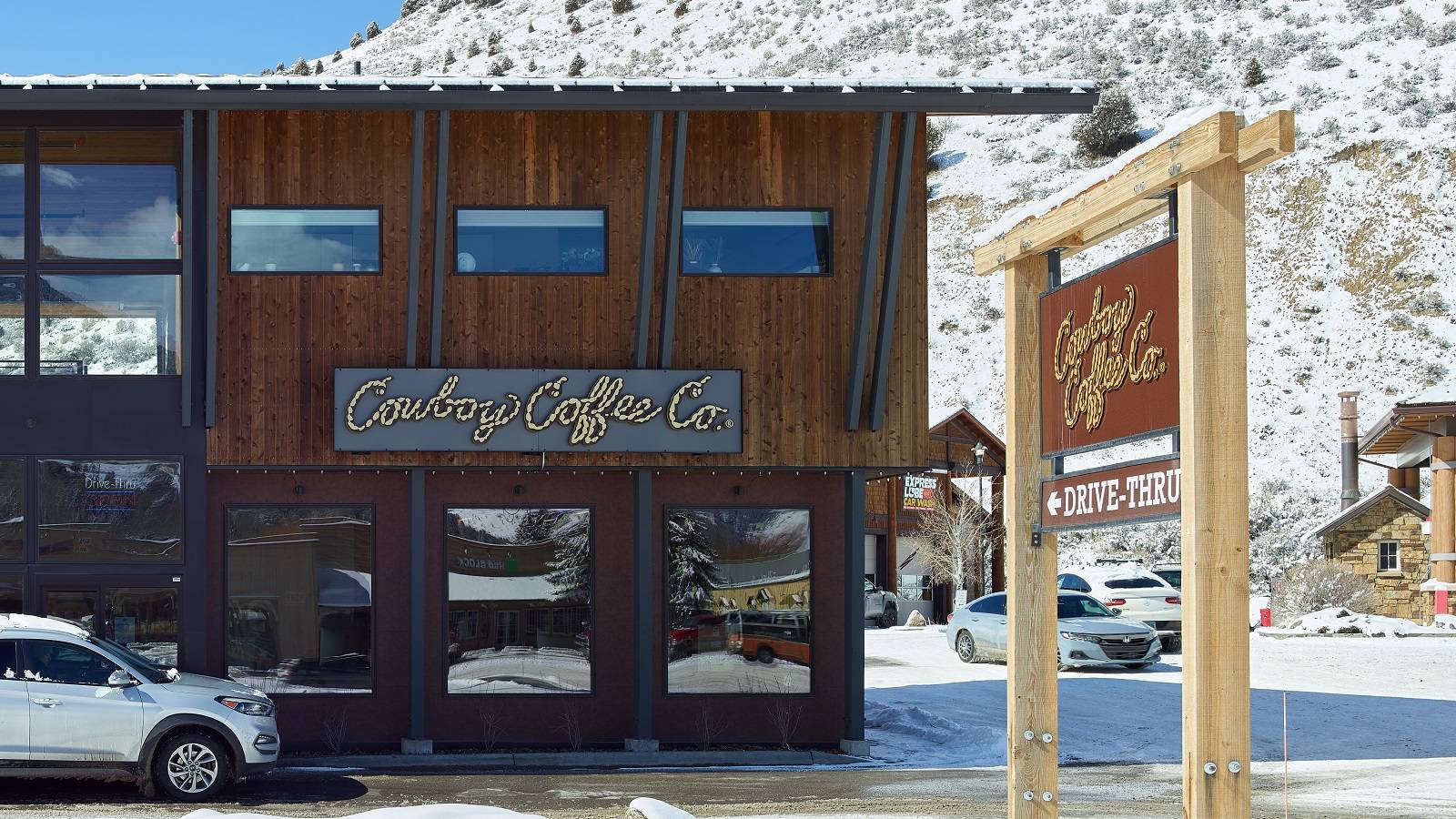 Exterior view of the front of the Cowboy Coffee Company building, a custom multi-use space designed and built by Farmer Payne Architects.
