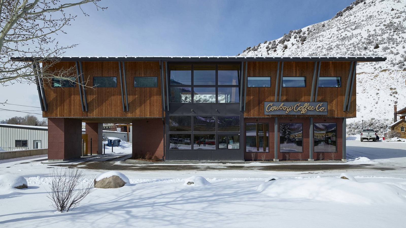 Exterior view of the front of the Cowboy Coffee Company building, a custom multi-use space designed and built by Farmer Payne Architects.